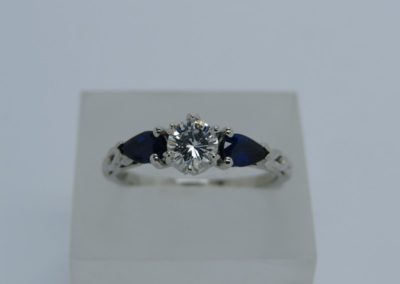 Sapphire and Diamond three stone ring, in Platinum