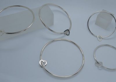 silver heart bangles made for bridesmaids
